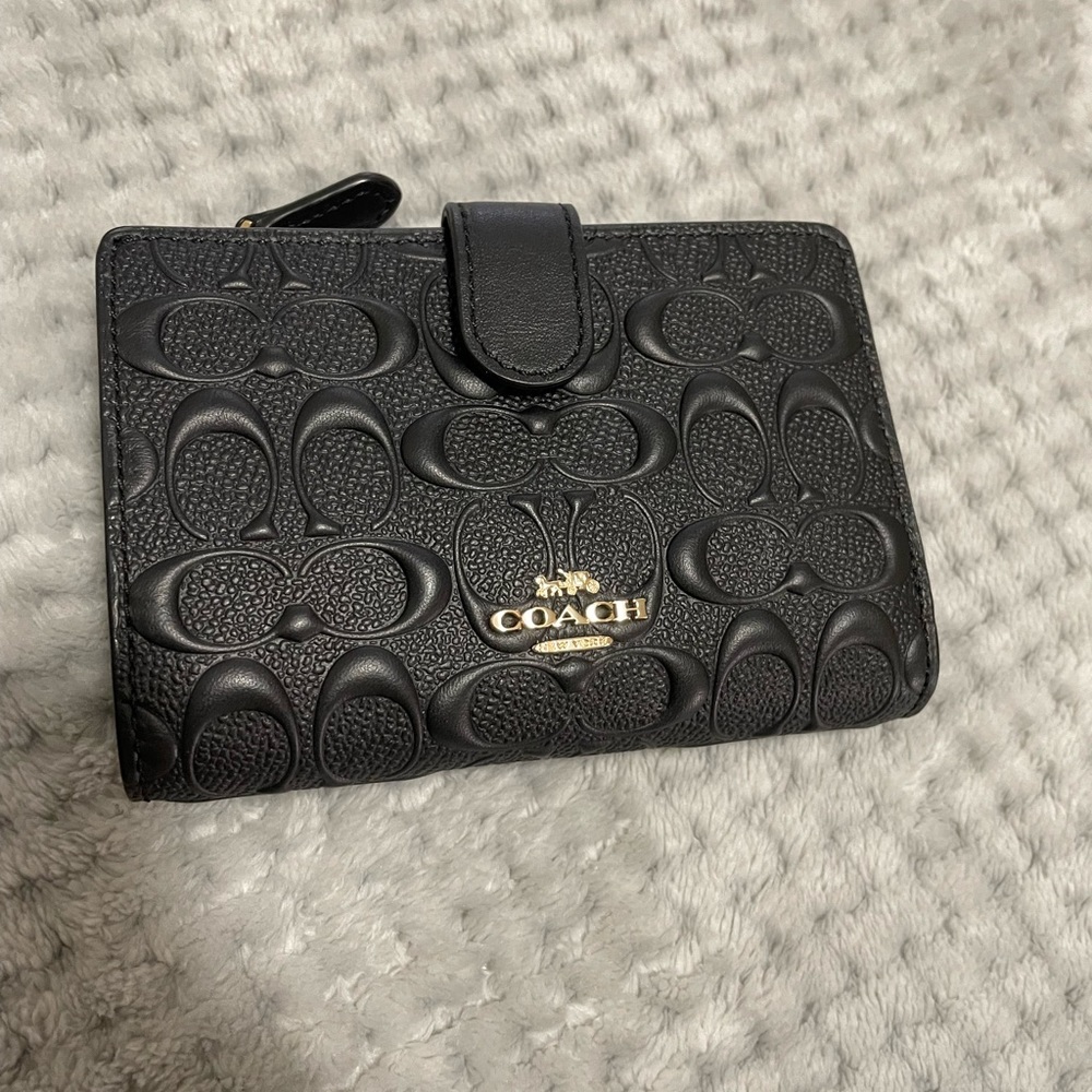 Black small coach wallet